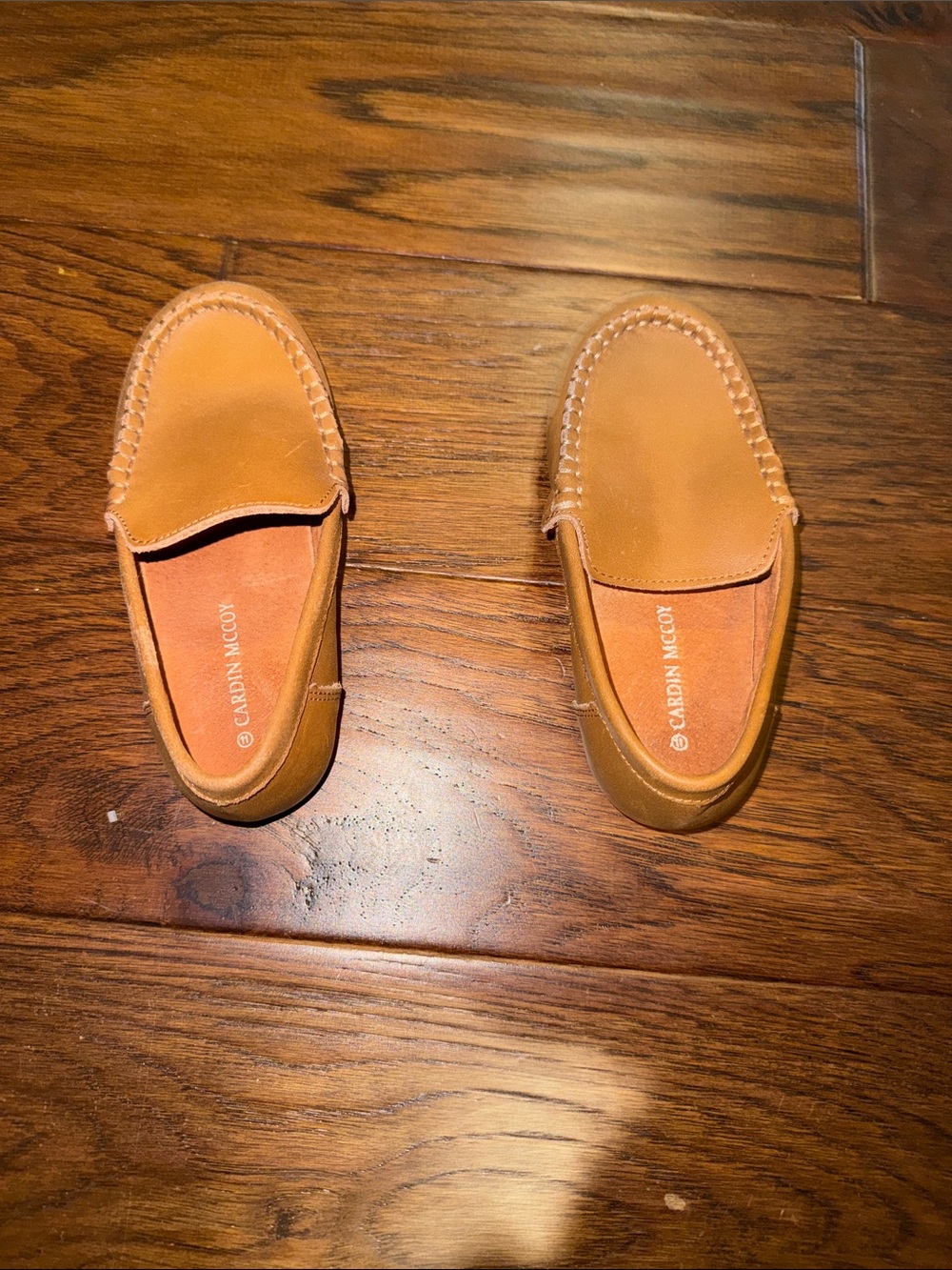 Kids Tan Moccasin Slip-Ons by CARDIN MCCOY